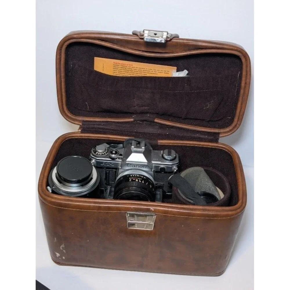 Canon AT-1 35mm Film Camera + 50mm f/1.8 Lens and Vivitar 75-205mm f/3.8 lens